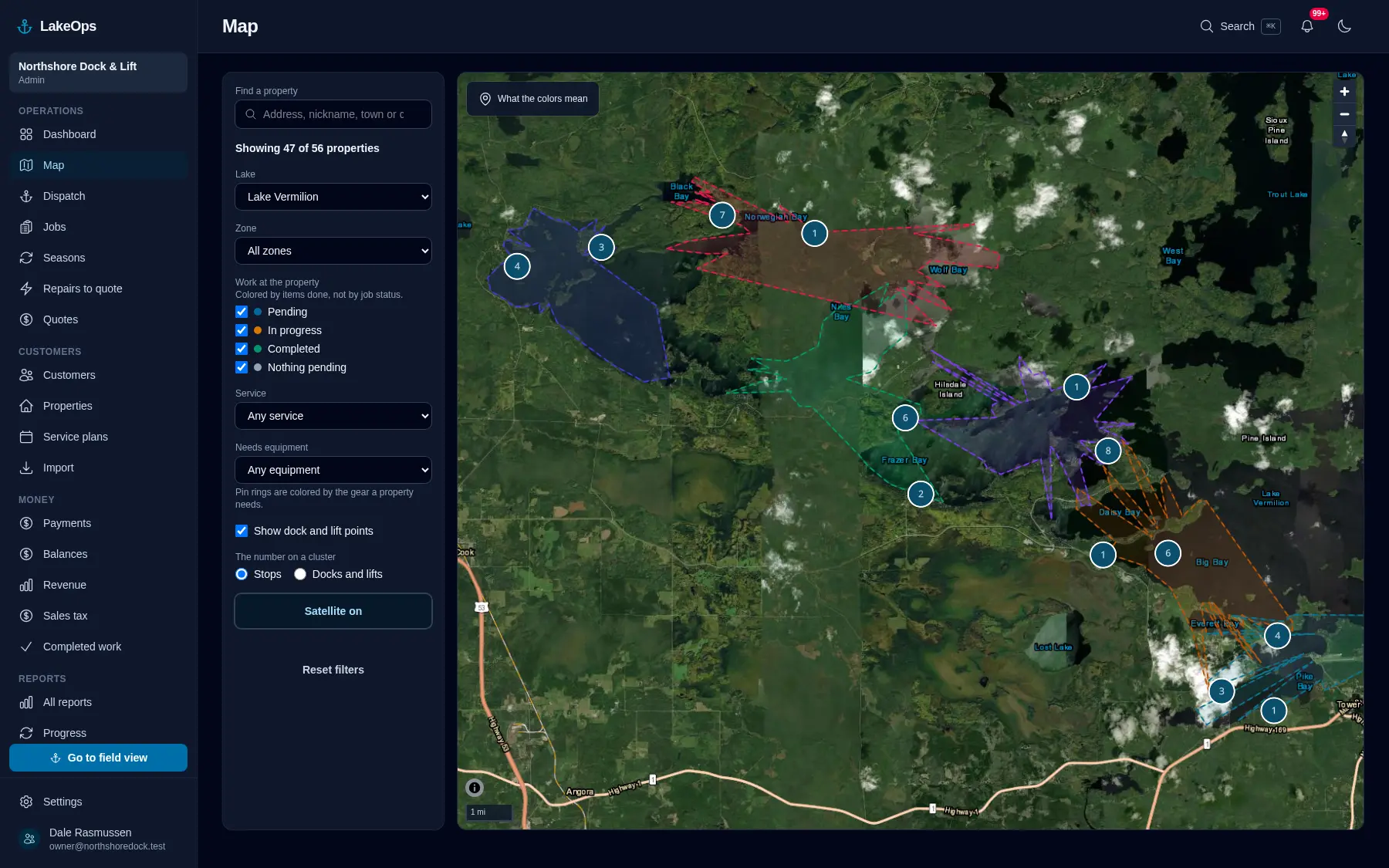 The LakeOps map over satellite imagery: properties pinned along a shoreline, zones outlined the way you split your lakes, and a filter panel for lake, zone, service and required equipment